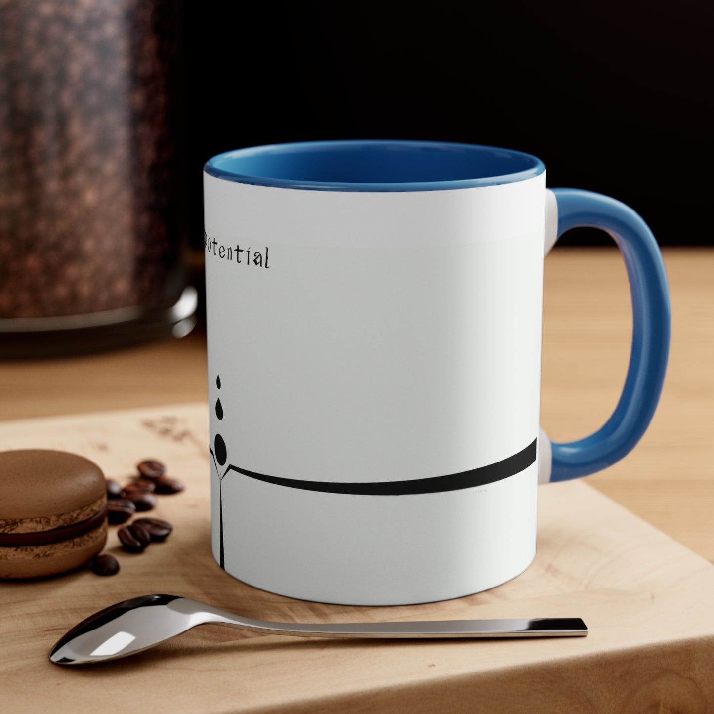 White Coffee Mug, blue handle, blue Inside, sitting on a table